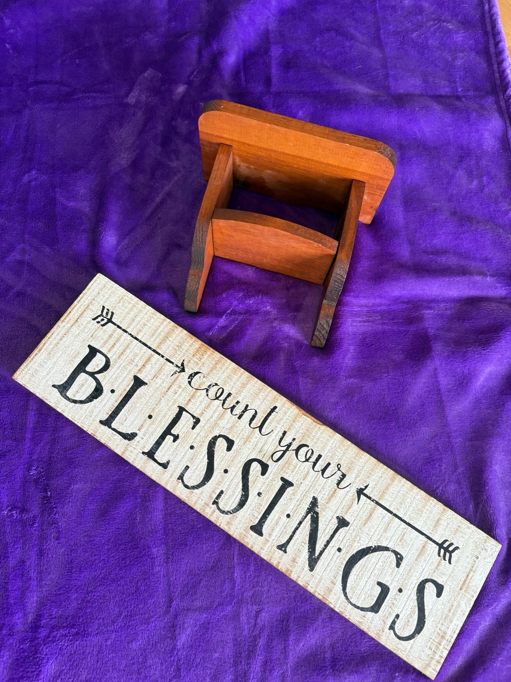 Count Your Blessings Wood Sign and a small display shelf